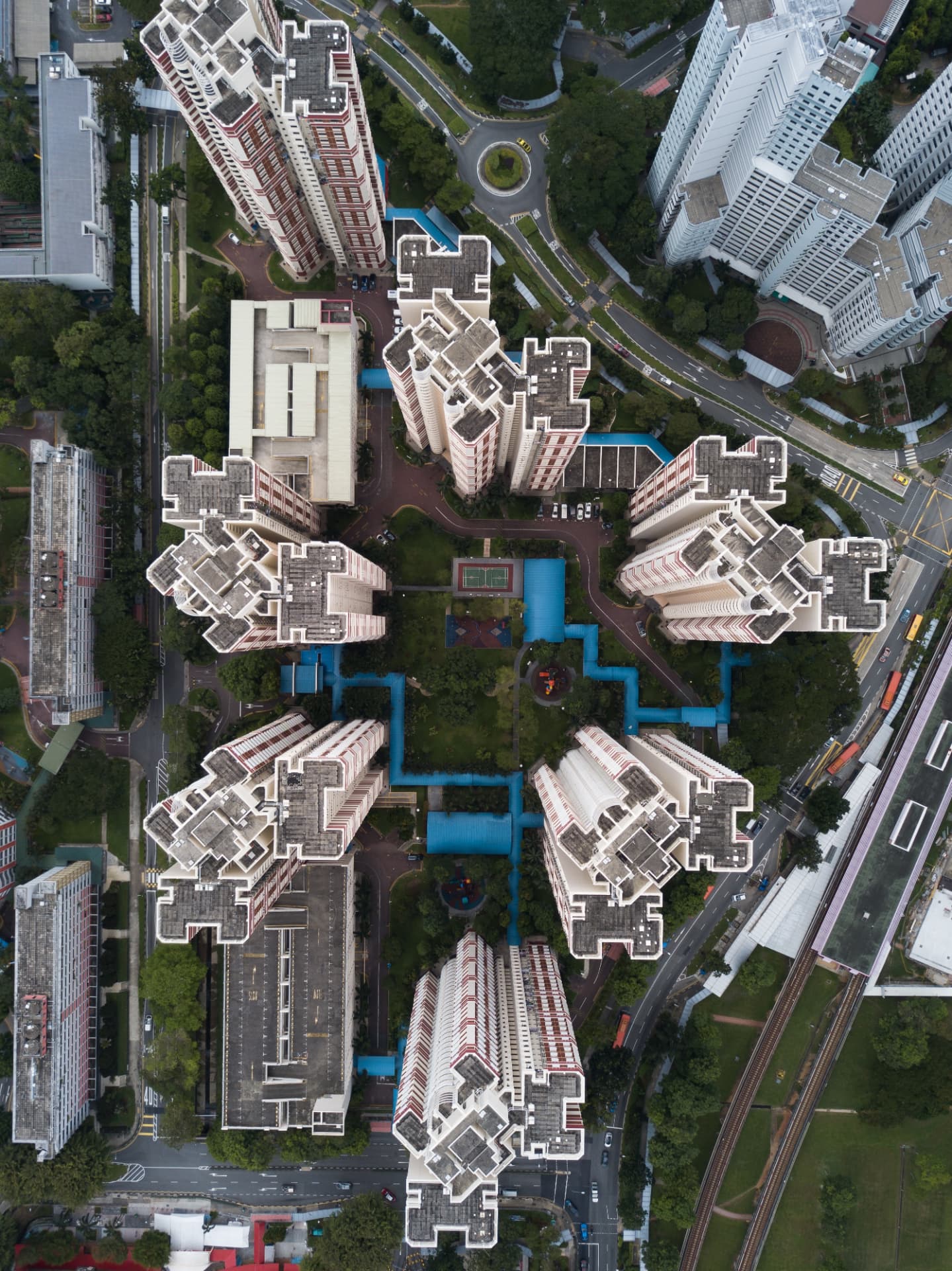 Aerial view of dense urban housing and transport infrastructure